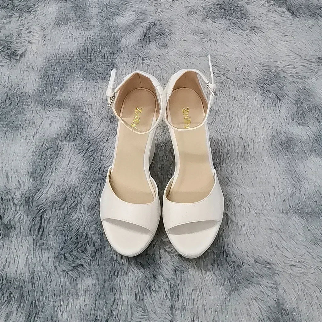 Nude ankle strap heel