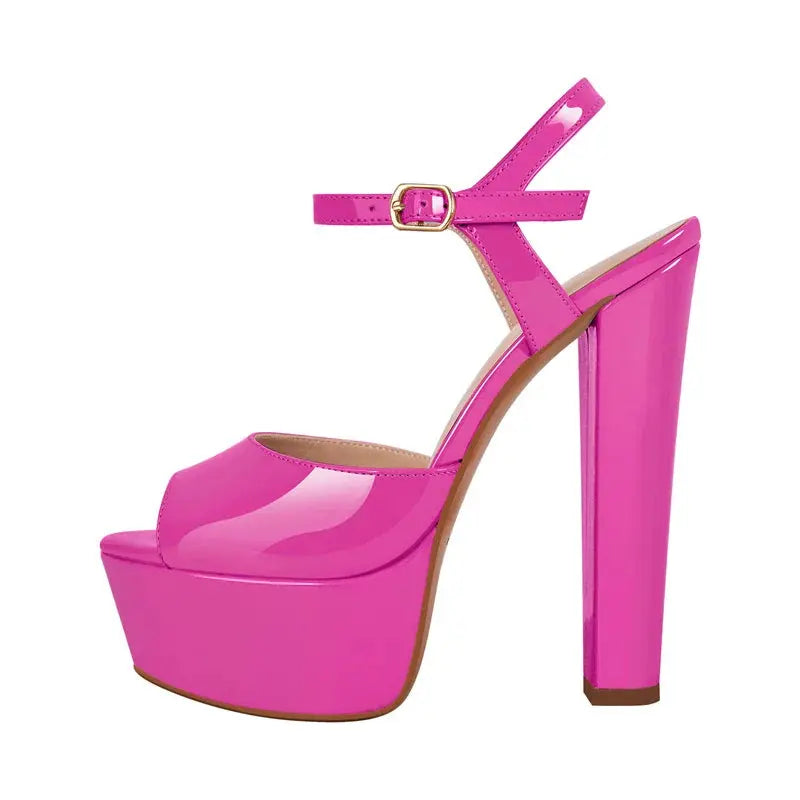 Pink high-heeled platform shoe on a white background