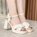 Beige heeled sandal with ankle strap