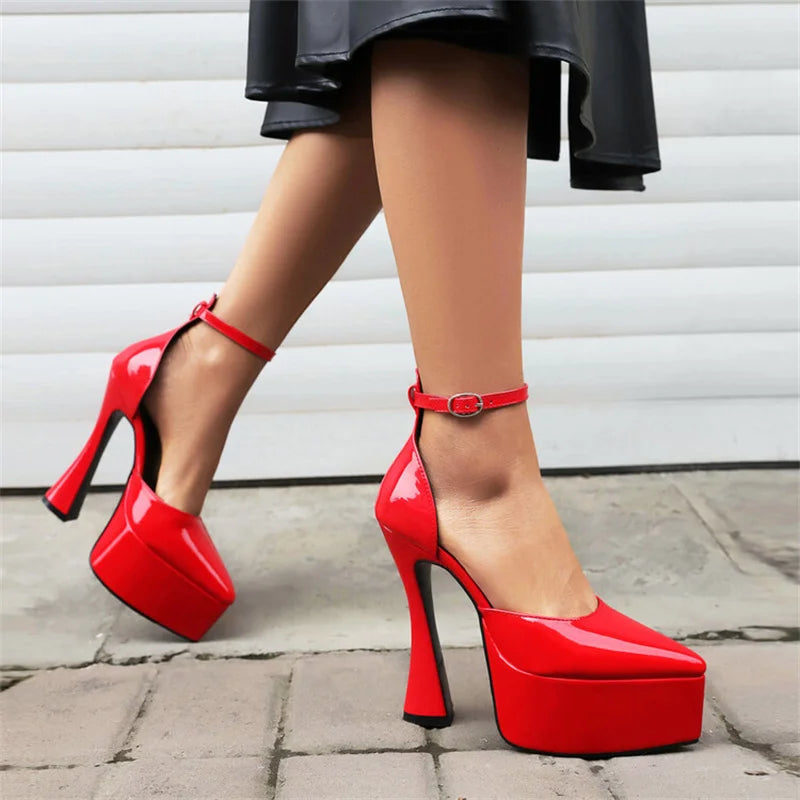 Black pointed heels with ankle strap