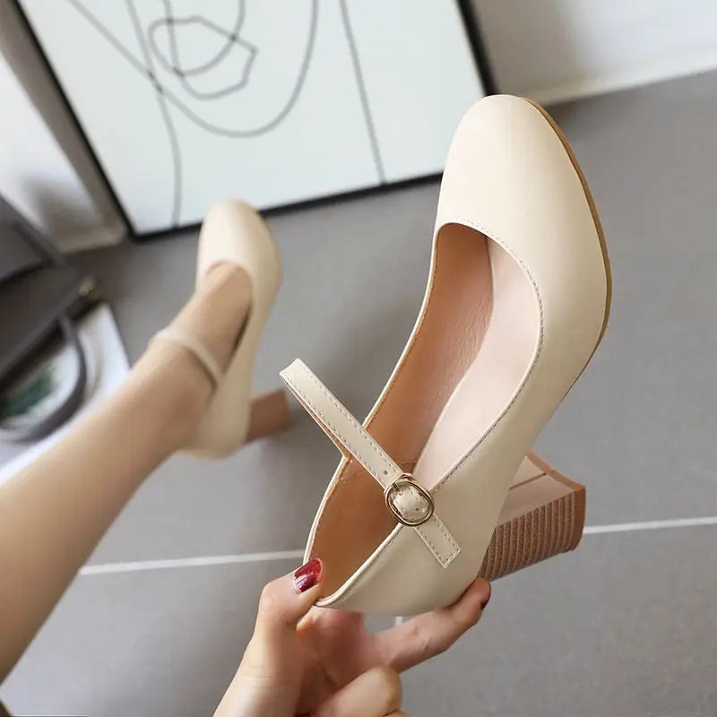 Beige closed toe with ankle strap heel
