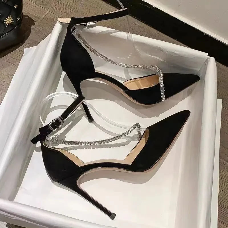 Black heel with diamond ankle strap