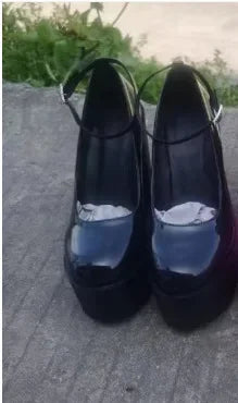 Black heel with thick ankle strap