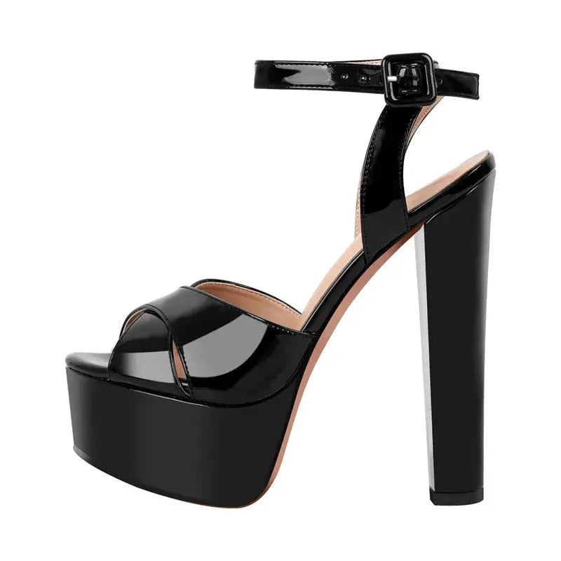 Black high-heeled platform sandal on a white background