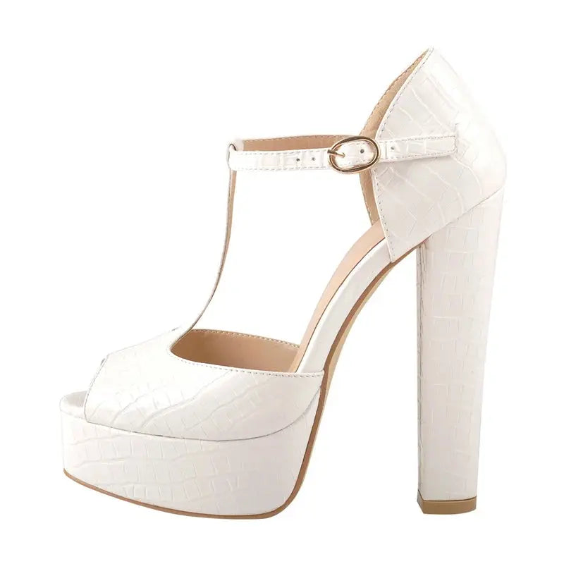 White high-heeled platform shoe on a white background