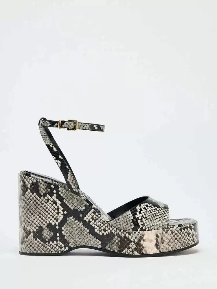 Snakeskin ankle strap heel