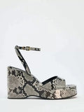 Snakeskin ankle strap heel