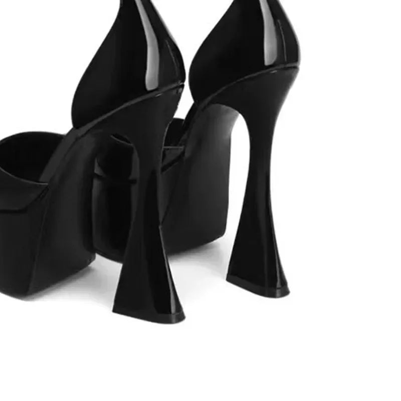Black pointed heels with ankle strap