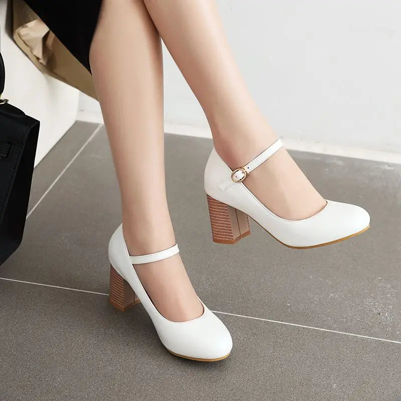 Beige closed toe with ankle strap heel