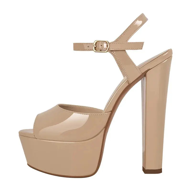 Beige high-heeled platform shoe on a white background