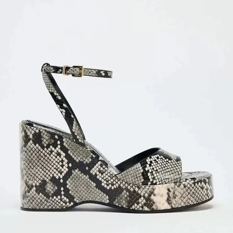 Snakeskin ankle strap heel