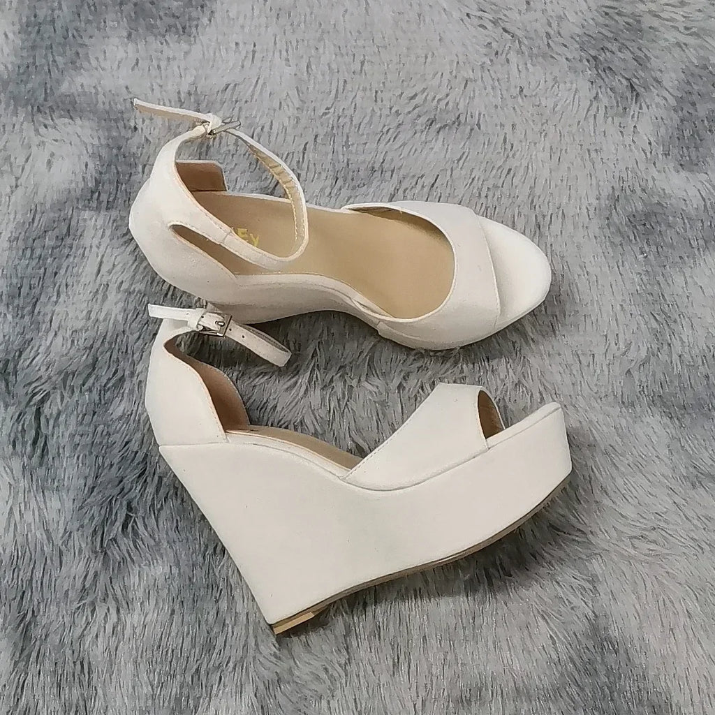 Nude ankle strap heel